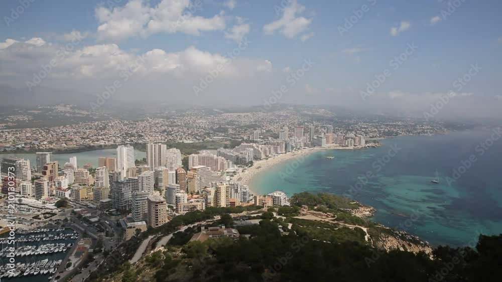 Costa Blanca coastline with blue sea and apartments Calpe Spain Levante La Fossa beach