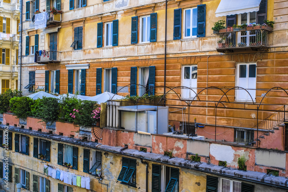 Genoa, Italy - June, 12, 2018: wall of a residential building in Genoa, Italy