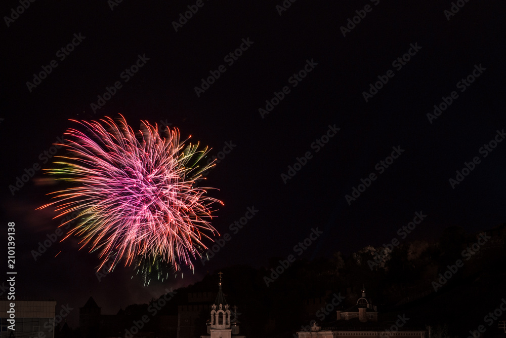 a shot of fireworks on a festive evening a shot of fireworks on a festive evening