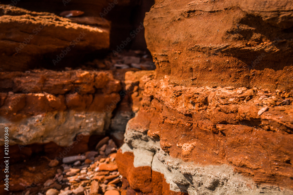 Fototapeta premium old clay canyon on the beach of the orange color