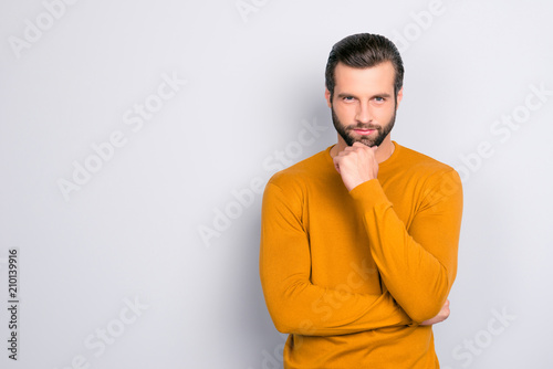 Portrait of attractive sexy trendy fashionable virile masculine mature well-proportioned good-looking wearing classical clothes touching chin thinking about plans isolated on gray background copyspace