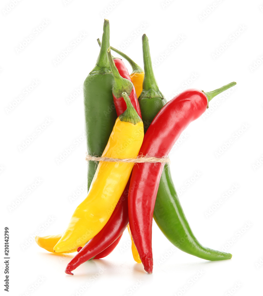 Different chili peppers on white background