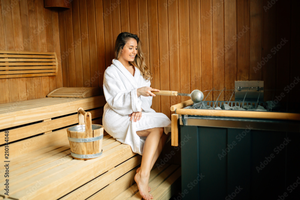 Beautiful woman resting in sauna Beautiful woman resting in sauna