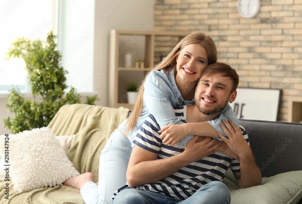 Happy loving couple at home