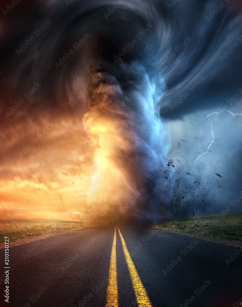 A powerful supercell storm at sunset producing a huge and destructive tornado touching down on a highway road. Mixed media illustration.