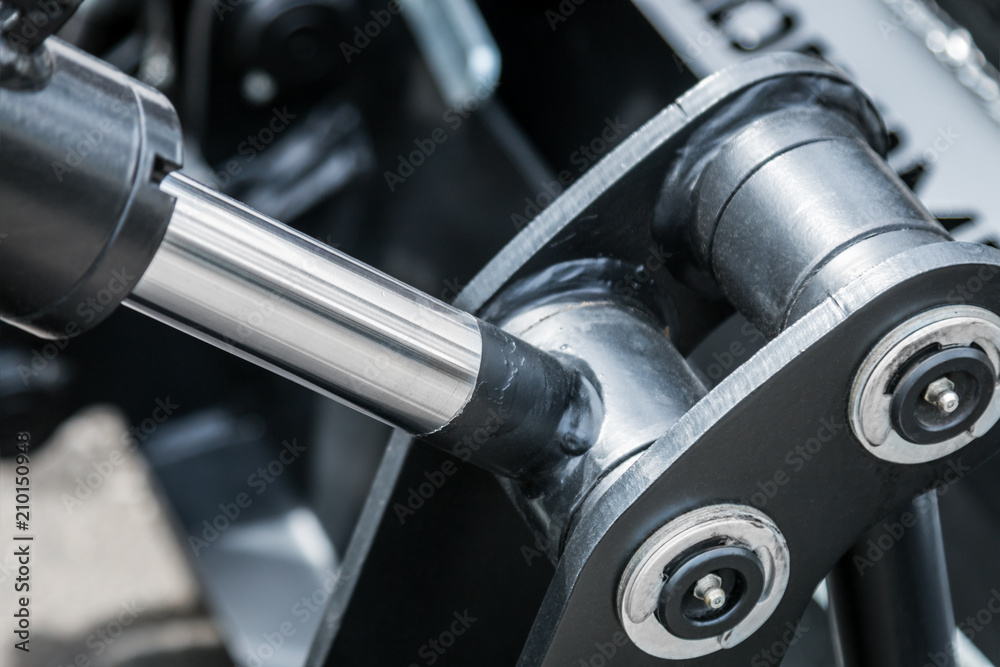 pipes and the hydraulic system of the tractor or excavator.Focus on the left side of the frame on the pipes pipes and the hydraulic system of the tractor or excavator.Focus on the left side of the frame on the pipes