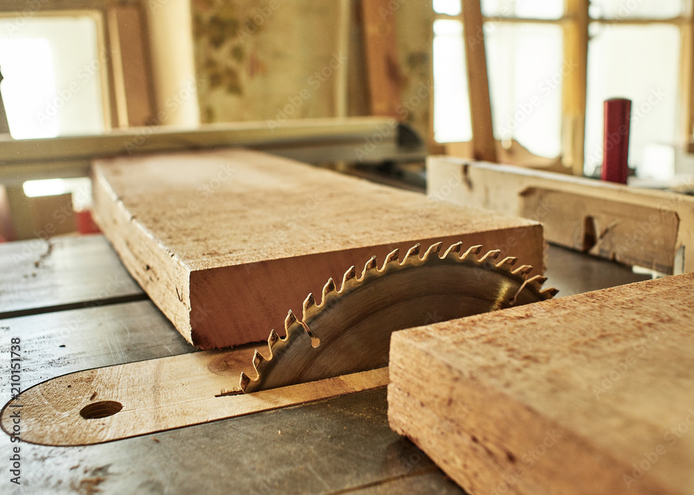 Sawing the board for the subsequent manufacture of the fretboard of a classical guitar. Sawing the board for the subsequent manufacture of the fretboard of a classical guitar.