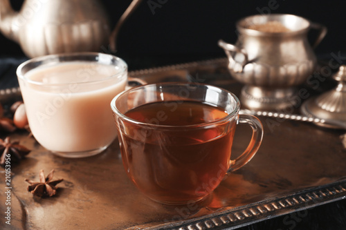 Fototapeta Naklejka Na Ścianę i Meble -  Glass cups of tea on tray