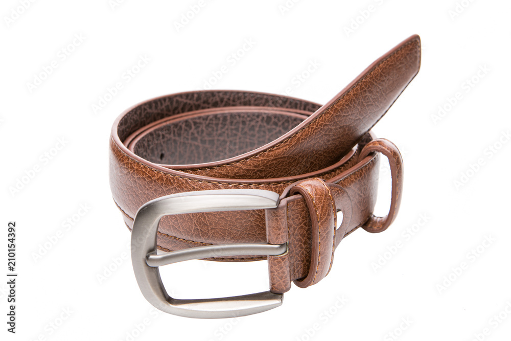 male brown belt with metal buckle, belt folded, on white background isolate, close-up male brown belt with metal buckle, belt folded, on white background isolate, close-up