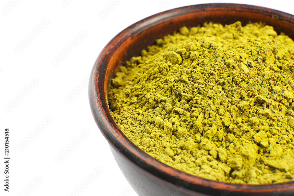 Bowl with powdered matcha green tea on white background, closeup Bowl with powdered matcha green tea on white background, closeup