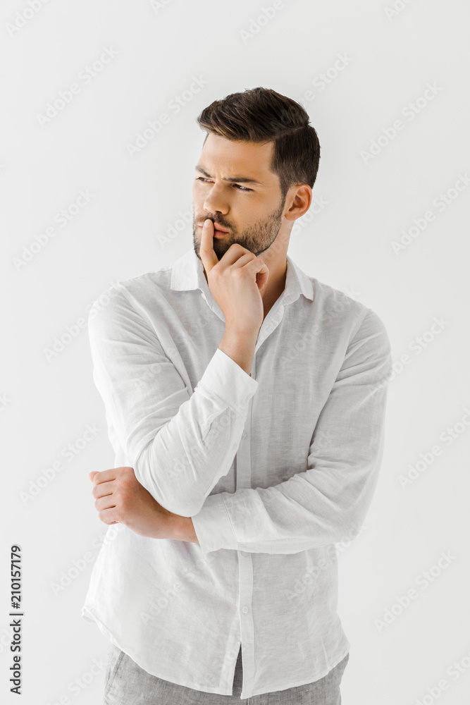 thoughtful man in linen white shirt isolated on grey background thoughtful man in linen white shirt isolated on grey background