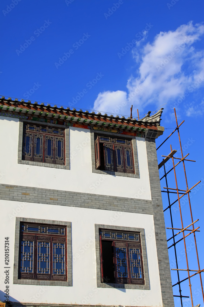 scaffolding and unfinished antique building