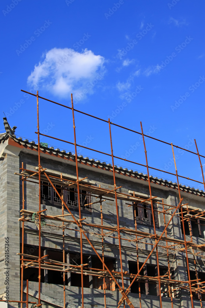 scaffolding and unfinished antique building scaffolding and unfinished antique building