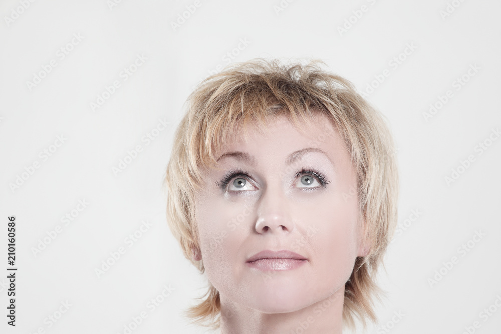 beautiful woman with day makeup looking at copy space beautiful woman with day makeup looking at copy space
