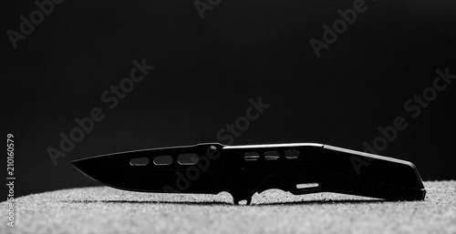 Εκτύπωση καμβά knife military on a dark background