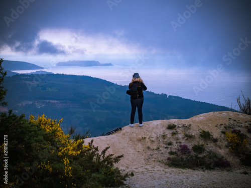 Unrecognizable woman looking the landscape © alexat25