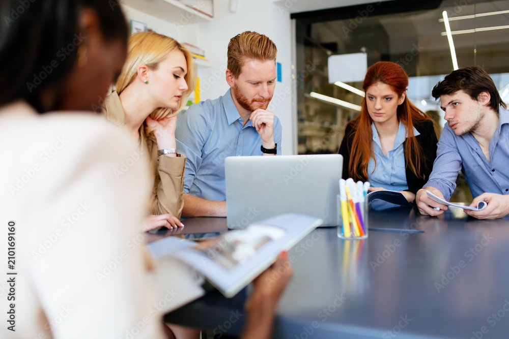 Businesspeople working in clean white office Businesspeople working in clean white office