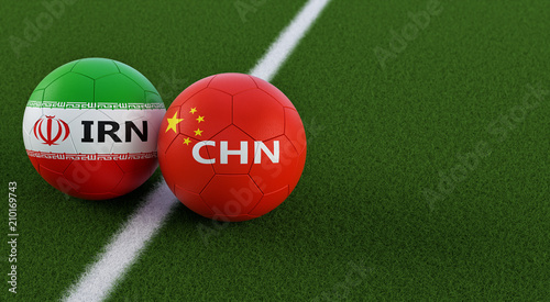 China vs. Iran Soccer Match - Soccer balls in Chinas and Irans national colors on a soccer field. Copy space on the right side - 3D Rendering 