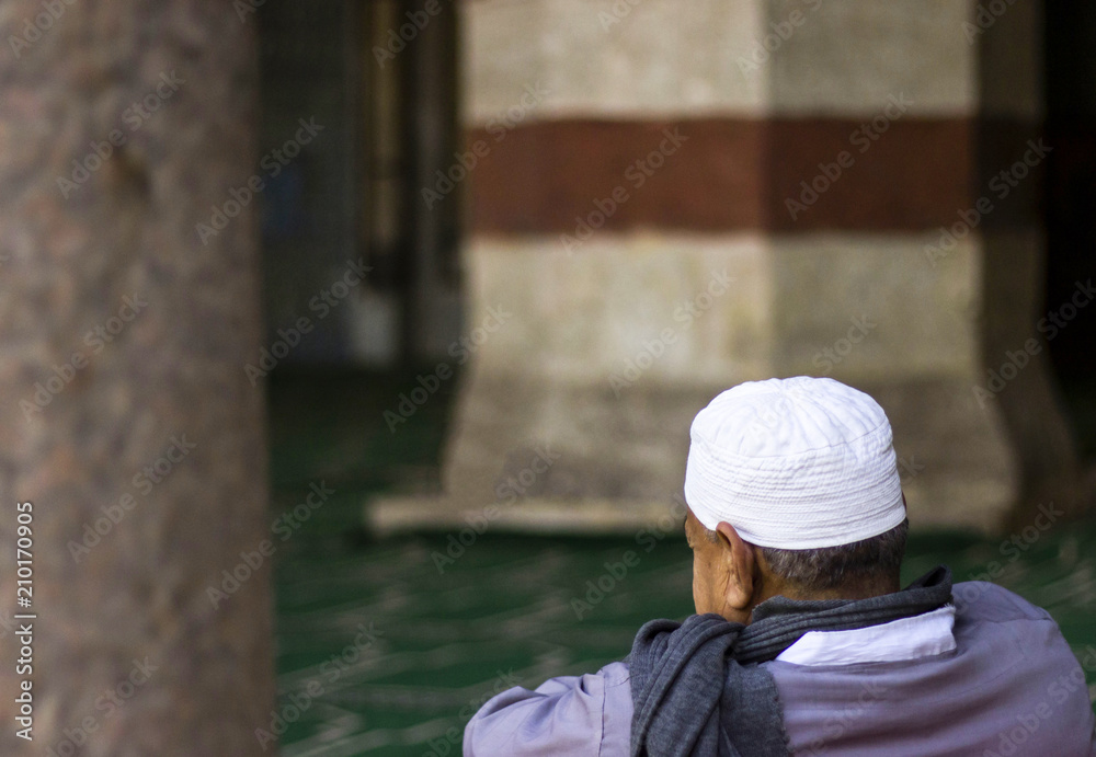 Old man in a mosque
