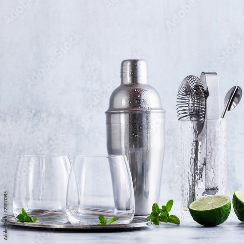 bar accessories on the table and two glasses of ice. tools for the restaurant