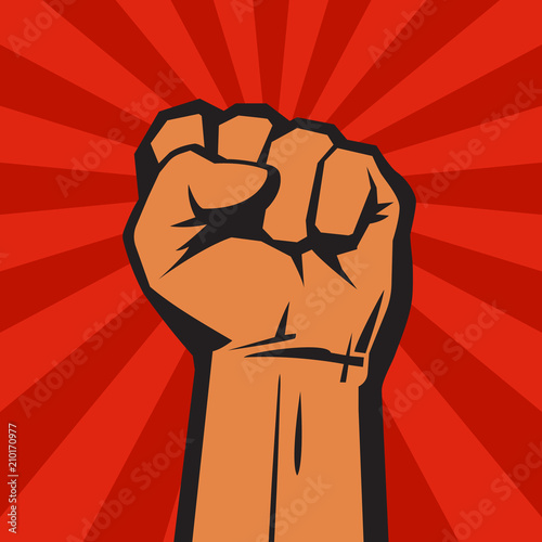 Raised hand with clenched fist on red background with sun rays.