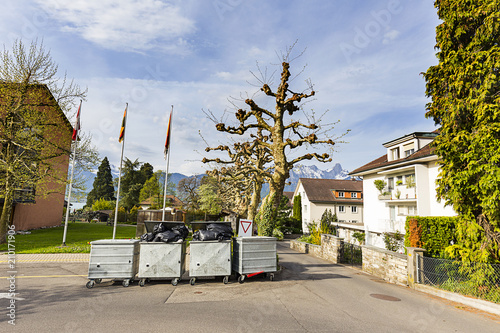 Four garbage bin in village at Thun Bern Switzerland photo