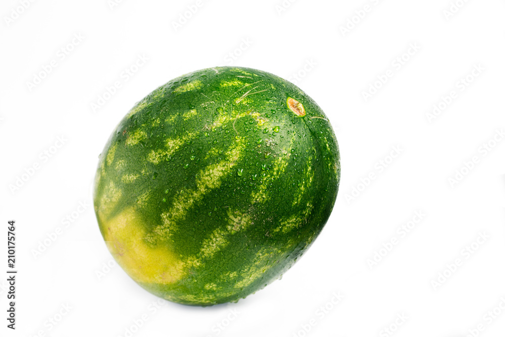 Ripe watermelon with water drops on a white background. Ripe watermelon with water drops on a white background.