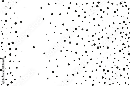 Black dots of different sizes on a white background. Abstract spray pattern.