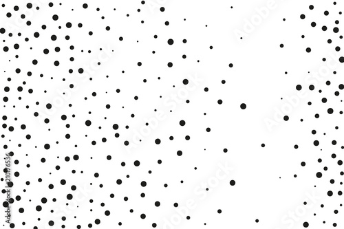 Black dots of different sizes on a white background. Abstract spray pattern.