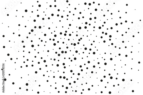 Black dots of different sizes on a white background. Abstract spray pattern.