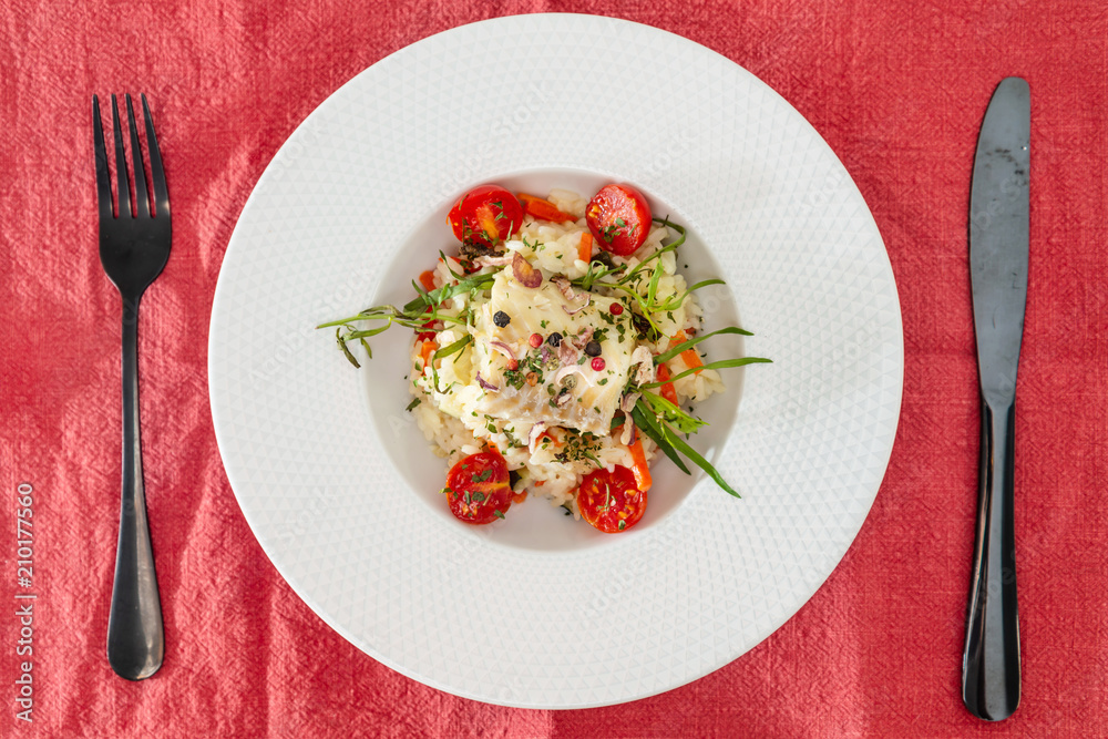 Cooked rice with vegetables, cod and lemon sauce Cooked rice with vegetables, cod and lemon sauce