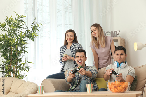 Young people playing video ...