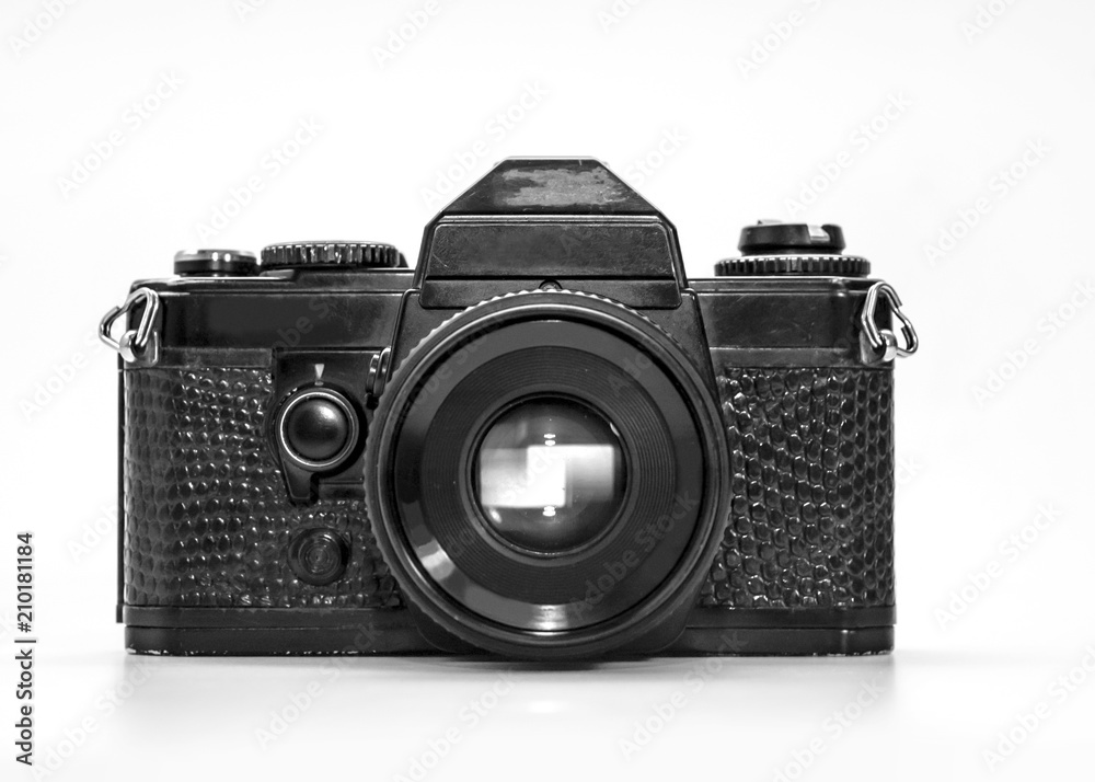 Balack vintage SLR camera on white blackground