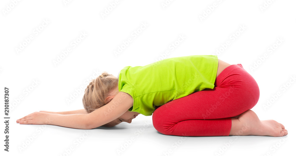 Little girl practicing yoga on white background Little girl practicing yoga on white background