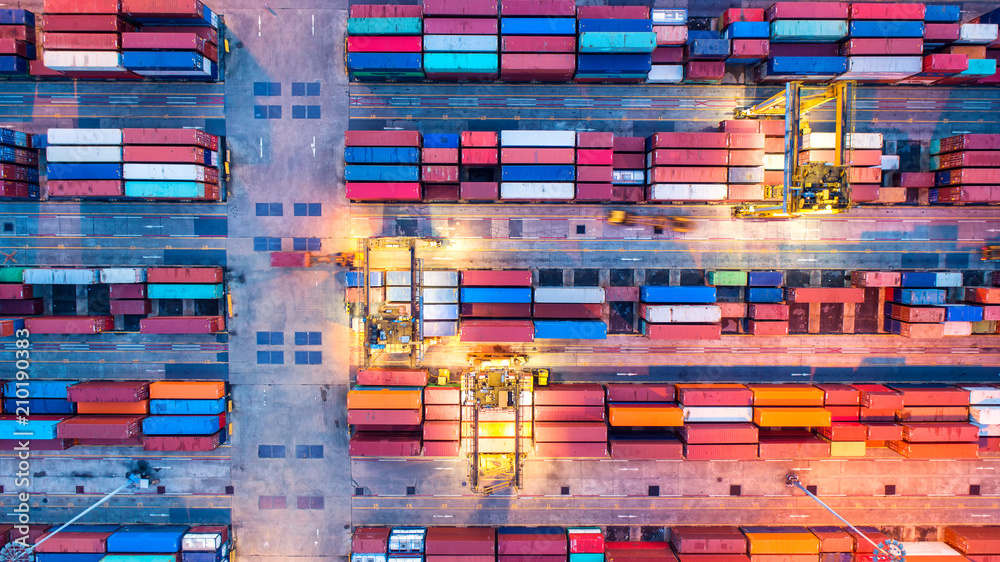 Container ship in export and import business and logistics. Shipping cargo to harbor by crane. Water transport International. Aerial view and top view. Container ship in export and import business and logistics. Shipping cargo to harbor by crane. Water transport International. Aerial view and top view.