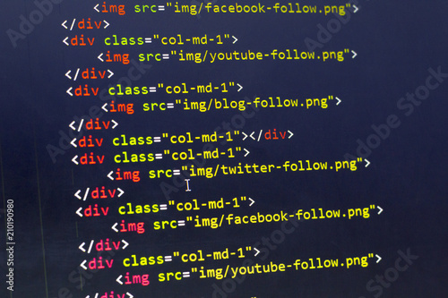 HTML with Bootstrap code of sharing website elements for most popular social networks. Web development source code abstract screen. Shallow depth of field. Code is created by myself. photo