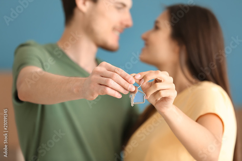 Happy young couple receivin...