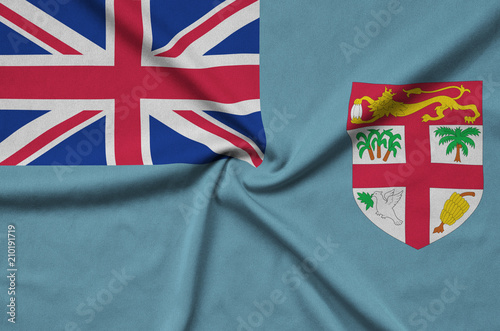 Fiji flag  is depicted on a sports cloth fabric with many folds. Sport team banner photo