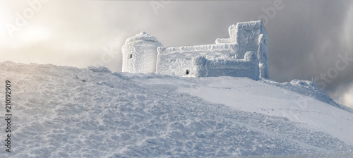 Slika na platnu abandoned snow-covered observatory on the mountain Pip Ivan, called White Elephant in the Carpathian mountains