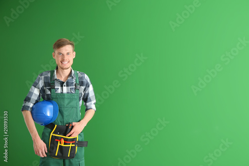 Male electrician on color b...