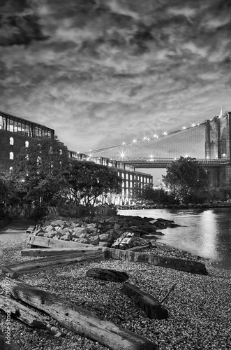 Under the Brooklyn Bridge, Dumbo side of the East River, New York, USA.