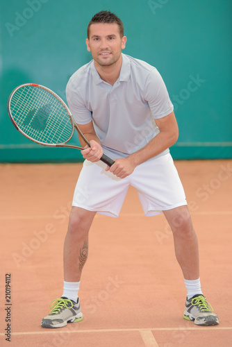 receiving serve in tennis match © auremar