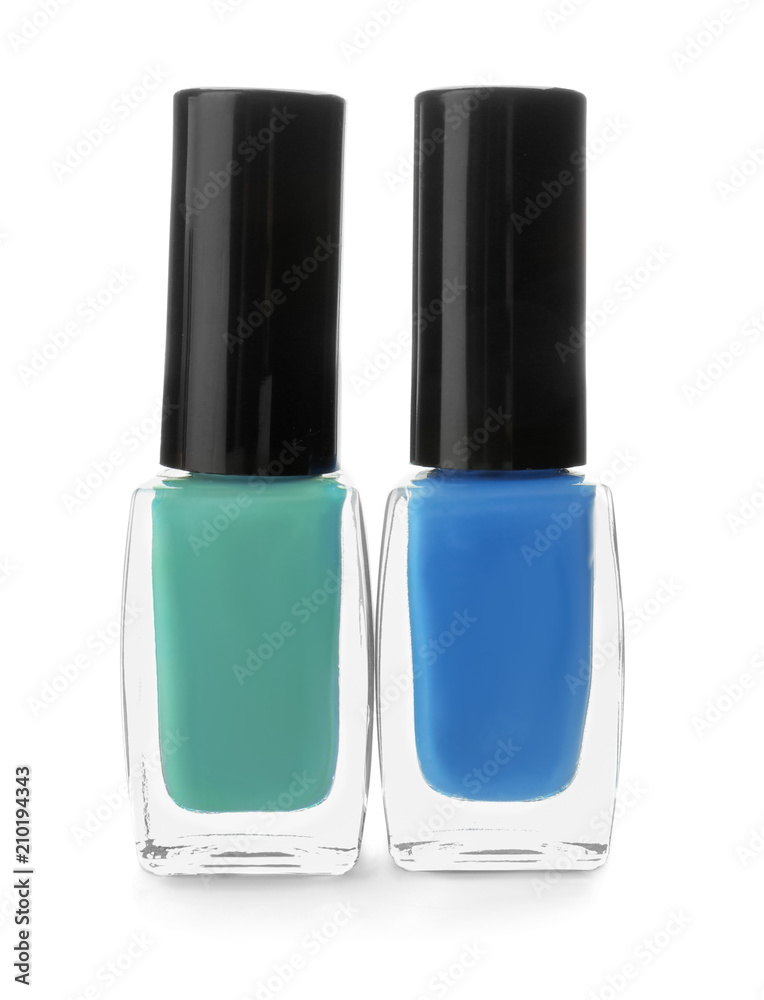 Bottles of colorful nail polish on white background Bottles of colorful nail polish on white background
