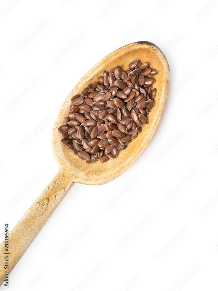 Wooden spoon with linseed or flax seed from lower left isolated on white background Wooden spoon with linseed or flax seed from lower left isolated on white background
