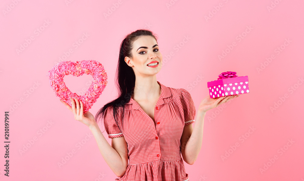 beautiful santa girl holding heart Christmas gift Box beautiful santa girl holding heart Christmas gift Box