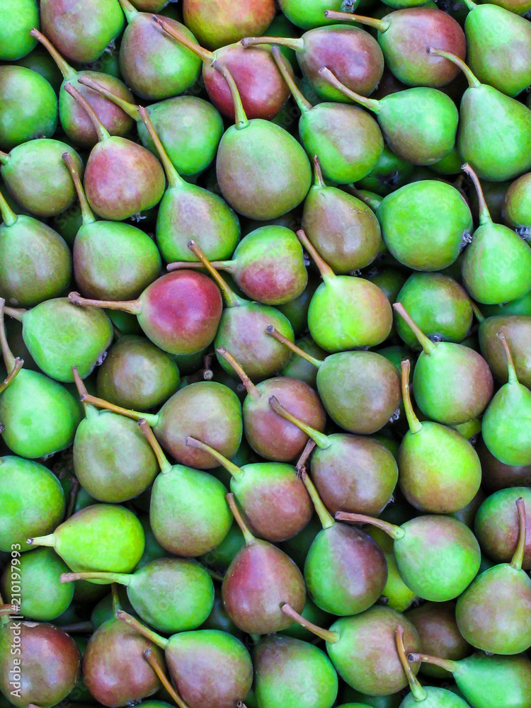 Fresh green pears as background
