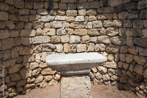 Marble ancient altar in the ancient antique basilica. Stone altar for performing rituals in the ancient religion.With vignette effect