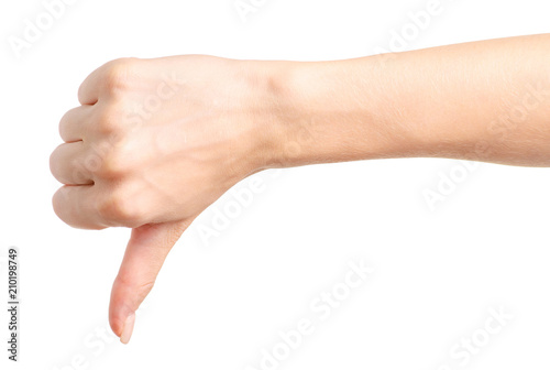 Female hands show thumb down on white background isolation