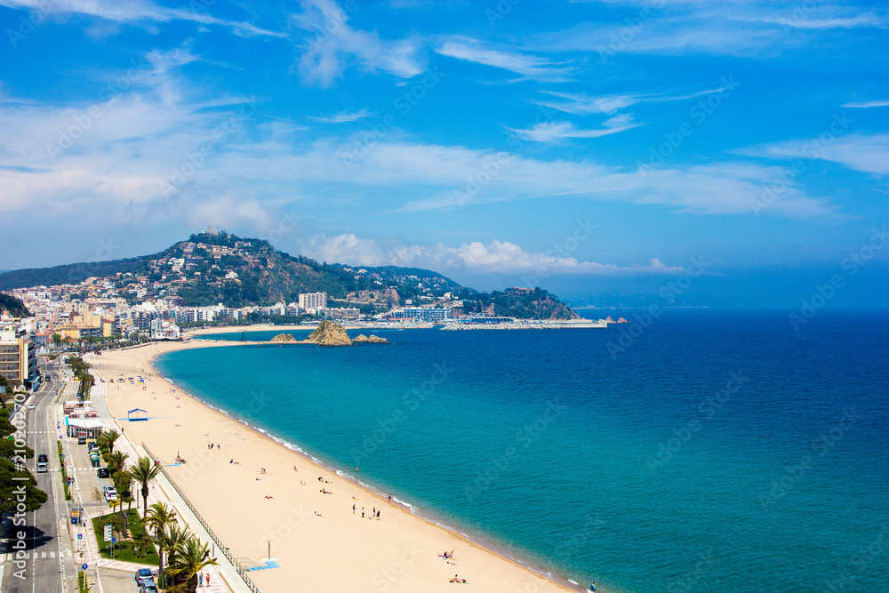 beautiful view of beach and town Blanes, Costa Brava, Catalonia, Spain - May 23, 2018: City Beach in Blanes