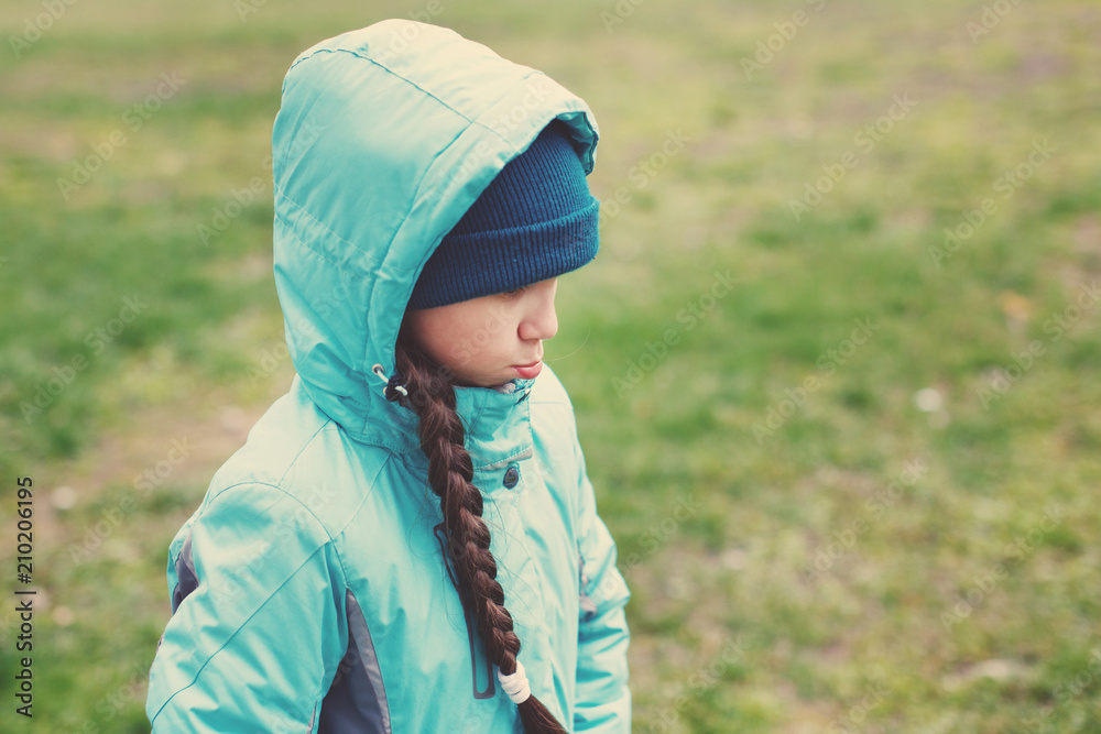 Little girl walking through the field Little girl walking through the field